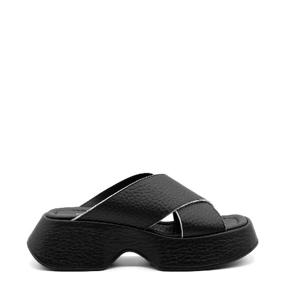 Mini Yoko criss-cross slip-ons in soft black nappa calfskin